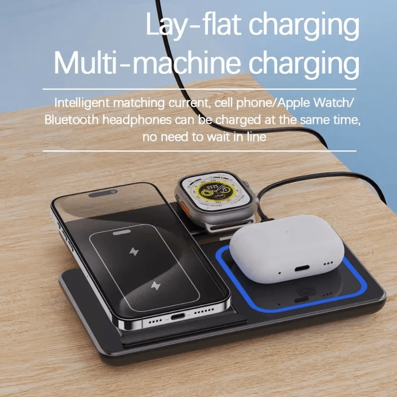 Multi-device wireless charging pad with smartphone, smartwatch, and wireless earbuds on a wooden surface.